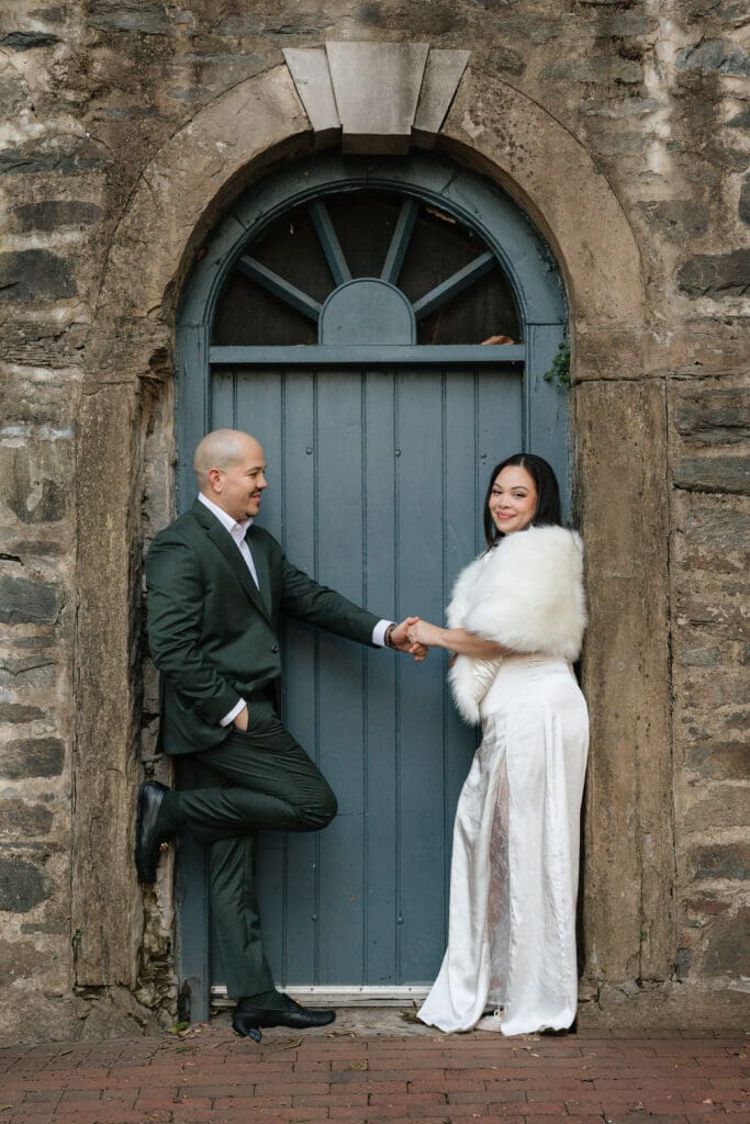 bride and groom pose during bridal portraits at Carlyle House in  Northern Virginia