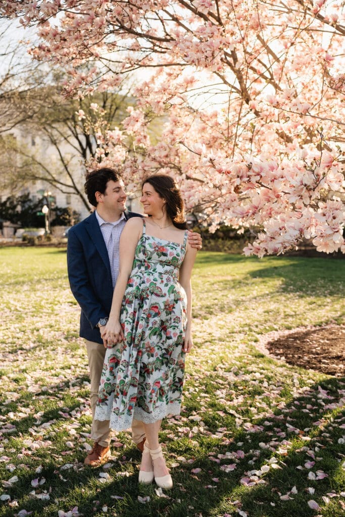 Couple smiles at each other during an engagement photoshoot in Washington DC.
