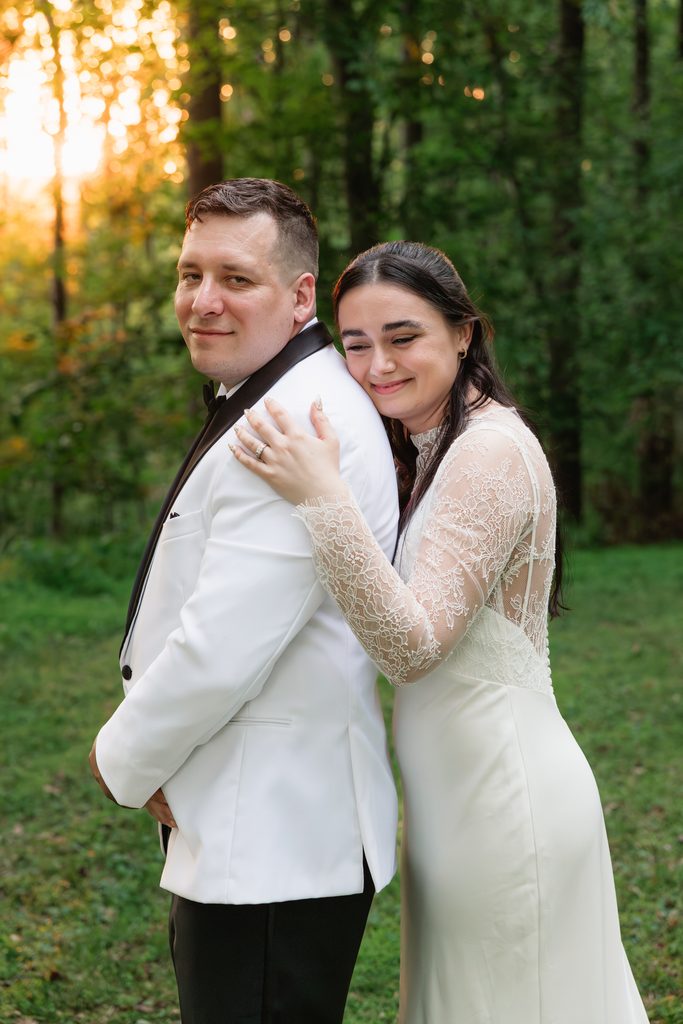 couple smiles for a wedding portrait during Northern VA golden hour wedding portraits